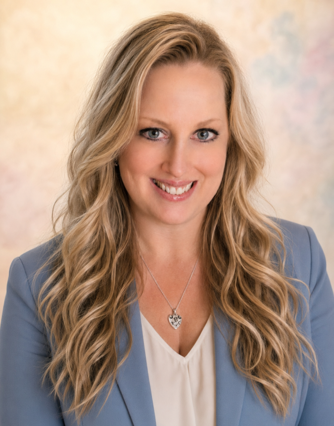 Portrait of Diane Cassi wearing a blue blazer